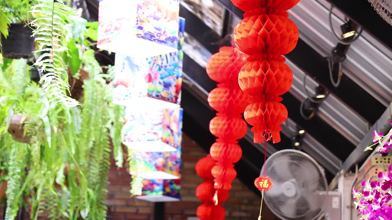 Red Lanterns and Decorations in an Indoor Setting