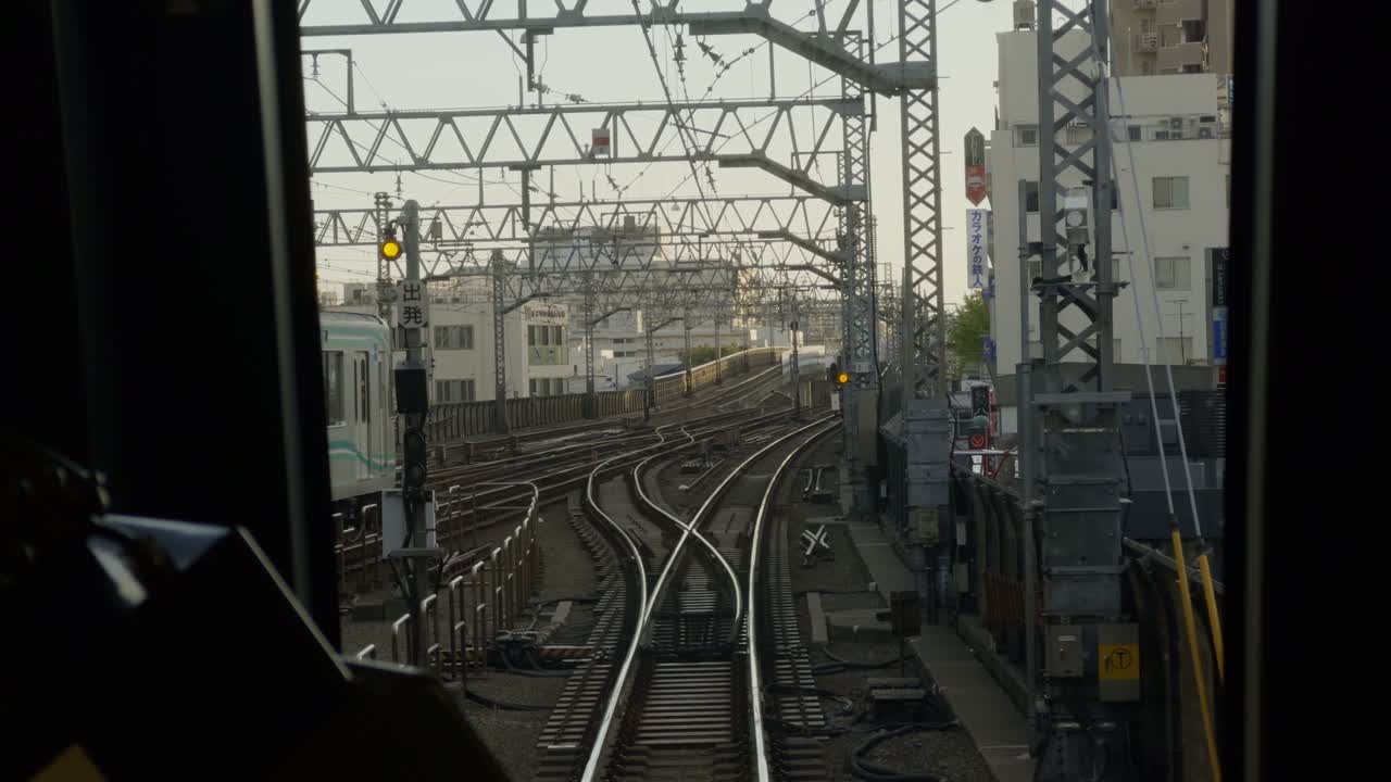 Warm Sunset Views on Tokyo’s Tokyu Line The sun sets over the Tokyu Line, casting a peaceful light on the tracks near Naka Meguro and Jiyugaok