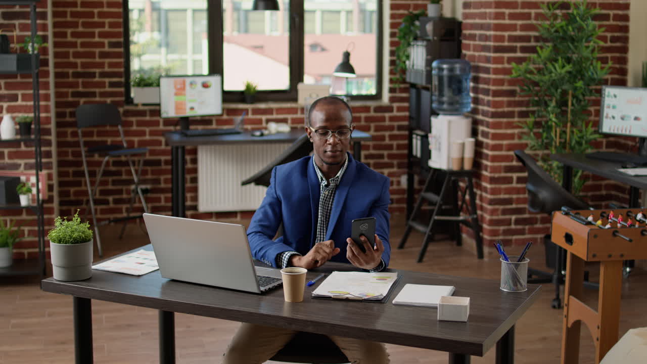 Financial analyst using smartphone to attend video call meeting