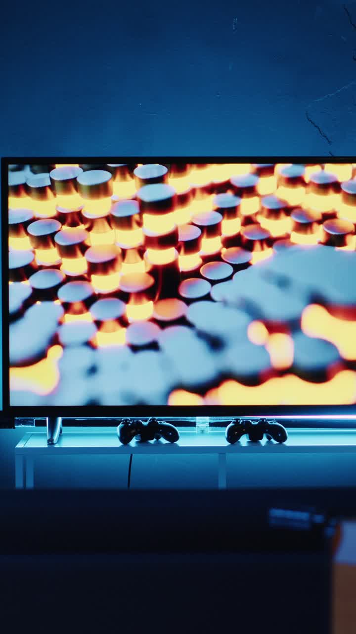 Vertical video Vertical video Close up shot of 3D rendered animations running on TV screen in empty house with warm lighting