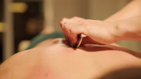 professional massage therapist performing relaxation massage