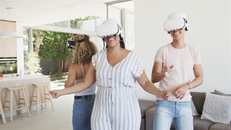 diverse friends enjoy virtual reality games at home