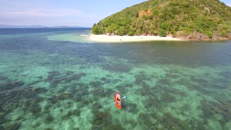 sea kayaker in the palawan philippines aerial