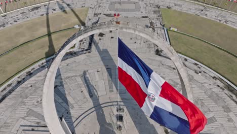 plaza de la bandera - triumphal arch with dominican republic flag in santo domingo city