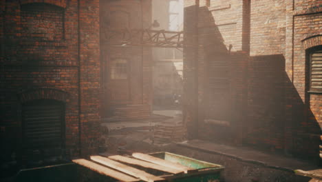 sunlit alleyway in an old brick factory