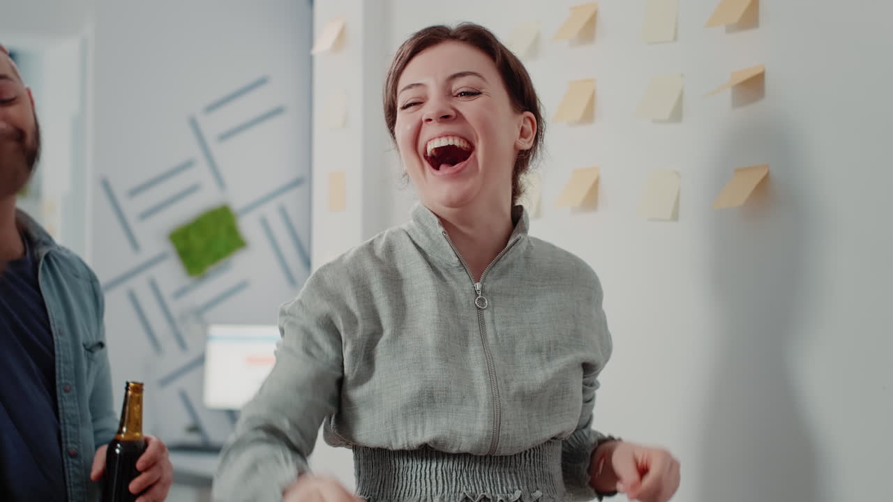 Close up of woman winning game at foosball table
