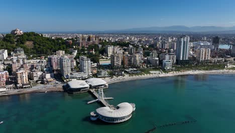 aerial view of ventus harbor hotel and pista e re bridge in durres, albania.