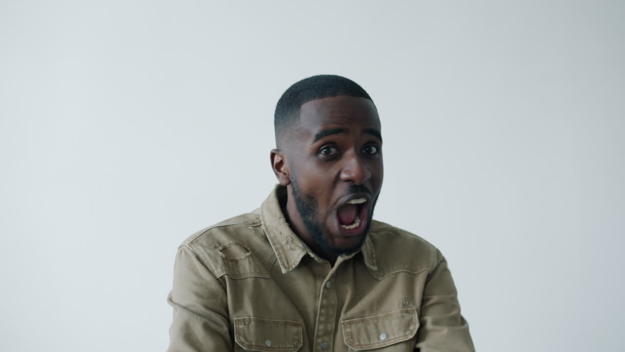 Man Expressing Surprise and Excitement