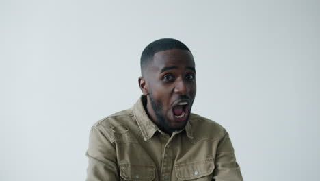 man expressing surprise and excitement