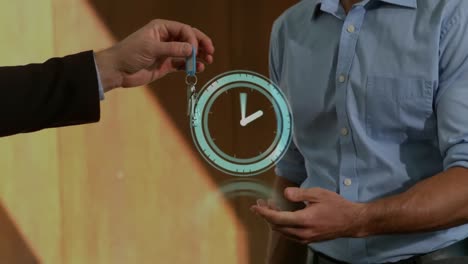 animation of moving clock over diverse business people working at office