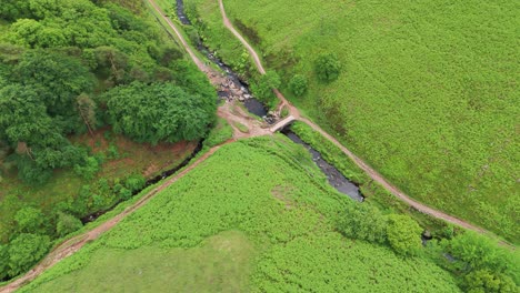 Aerial-rotating-shot-of-three-shire-heads-at-Dane-Valley-in-England