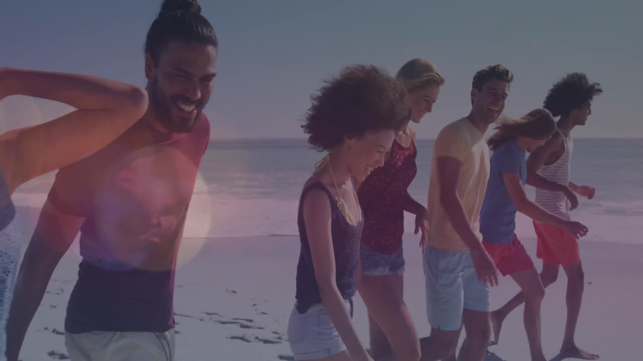 은 날 해변에서 산책하는 다양한 젊은 친구들에 대한 렌즈 플레어의 애니메이션