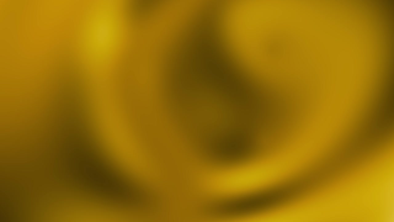An animation loop of an abstract yellow liquid plasma field moving slowly and constantly changing its shape and form