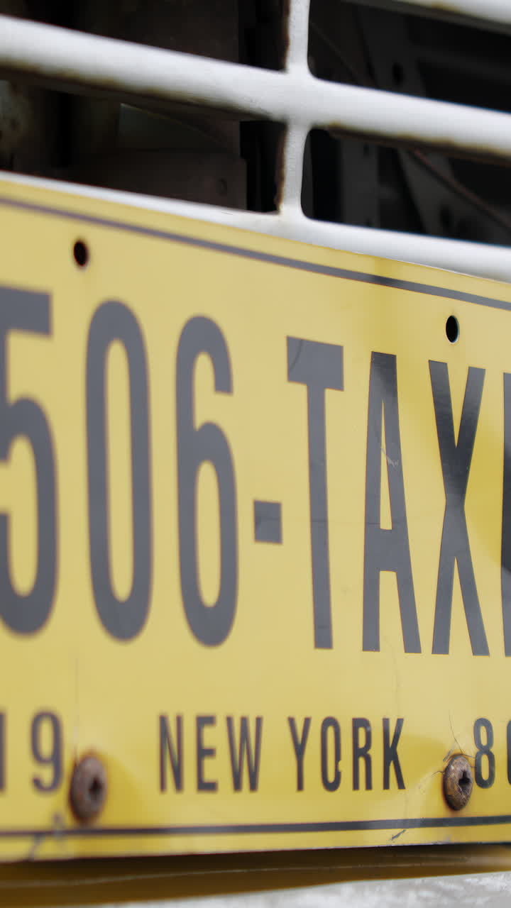 Close-up of a New York City Taxi License Plate
