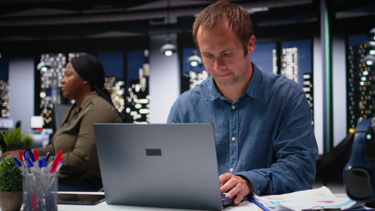 Business manager in modern workplace sharing insights and reports