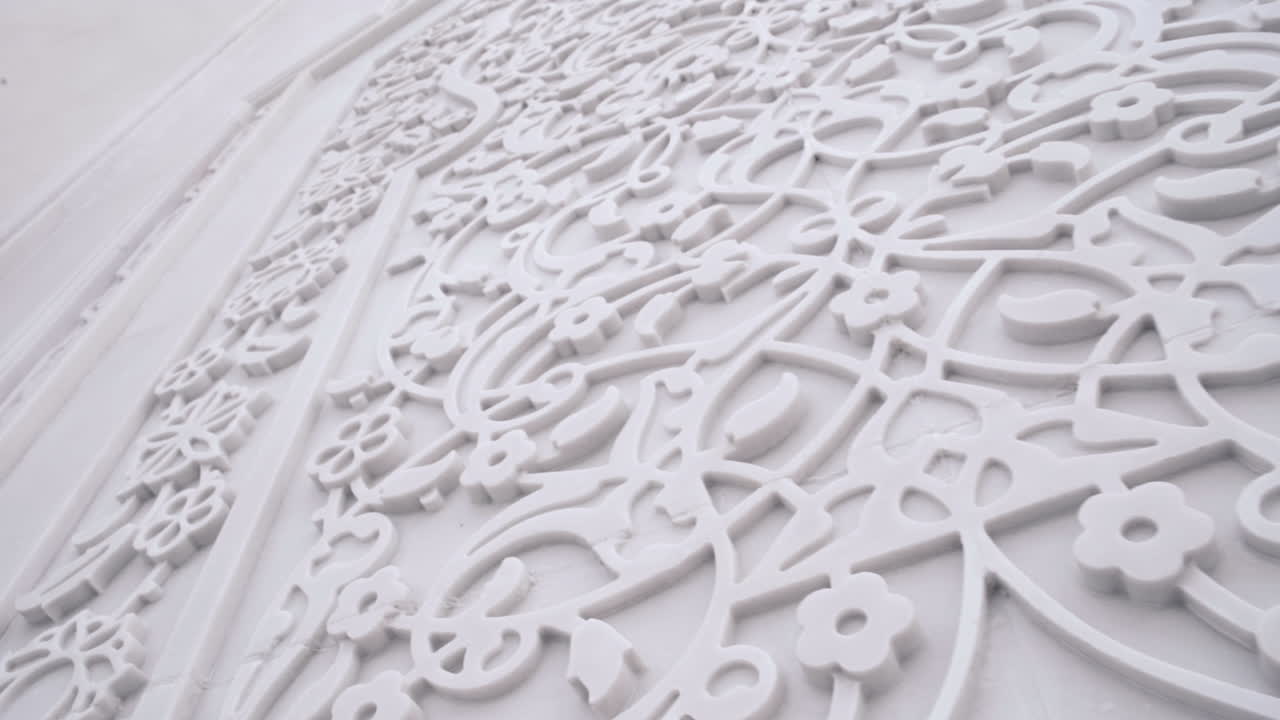 Intricate White Relief Carving