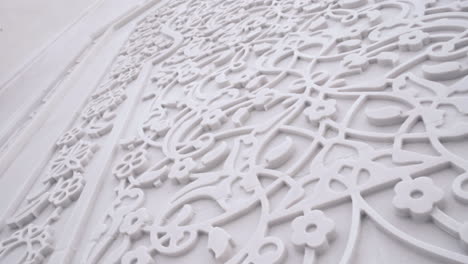 intricate white relief carving