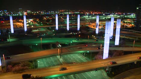 Pan-across-an-overview-of-Los-Angeles-International-airport-at-dusk-with-traffic-arriving