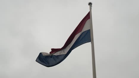 national flag of the netherlands in the capital city of amsterdam