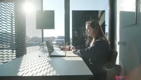 car service manager working at desk in office