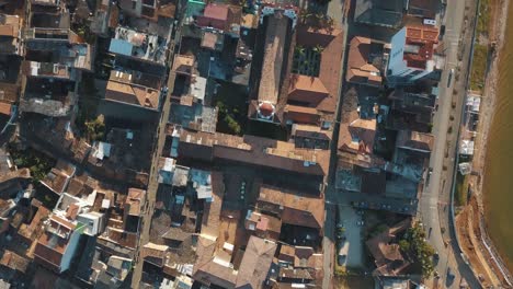 drone aerial bird's-eye view of the main square of the city in el peñol guatapé, medeliin, colombia