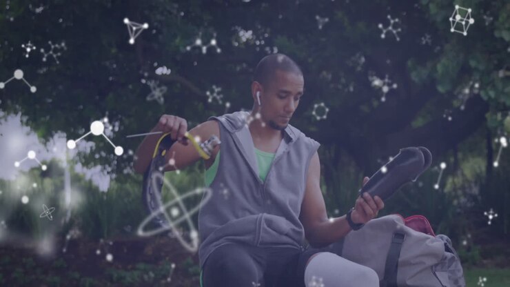 Animation of communication networks over disabled male athlete attaching running blade outdoors