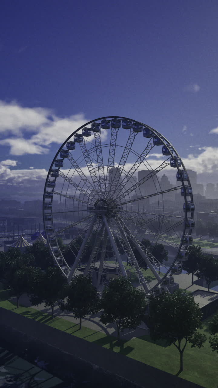 Ferris wheel stands tall against skyline at dusk near waterfront carnival