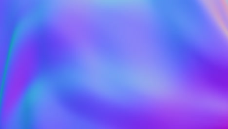 flowing and wavy blurred image of colorful fabric in purple, blue, and pink