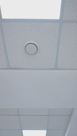 ceiling lights custom designed. white ceiling with neon lights in the office