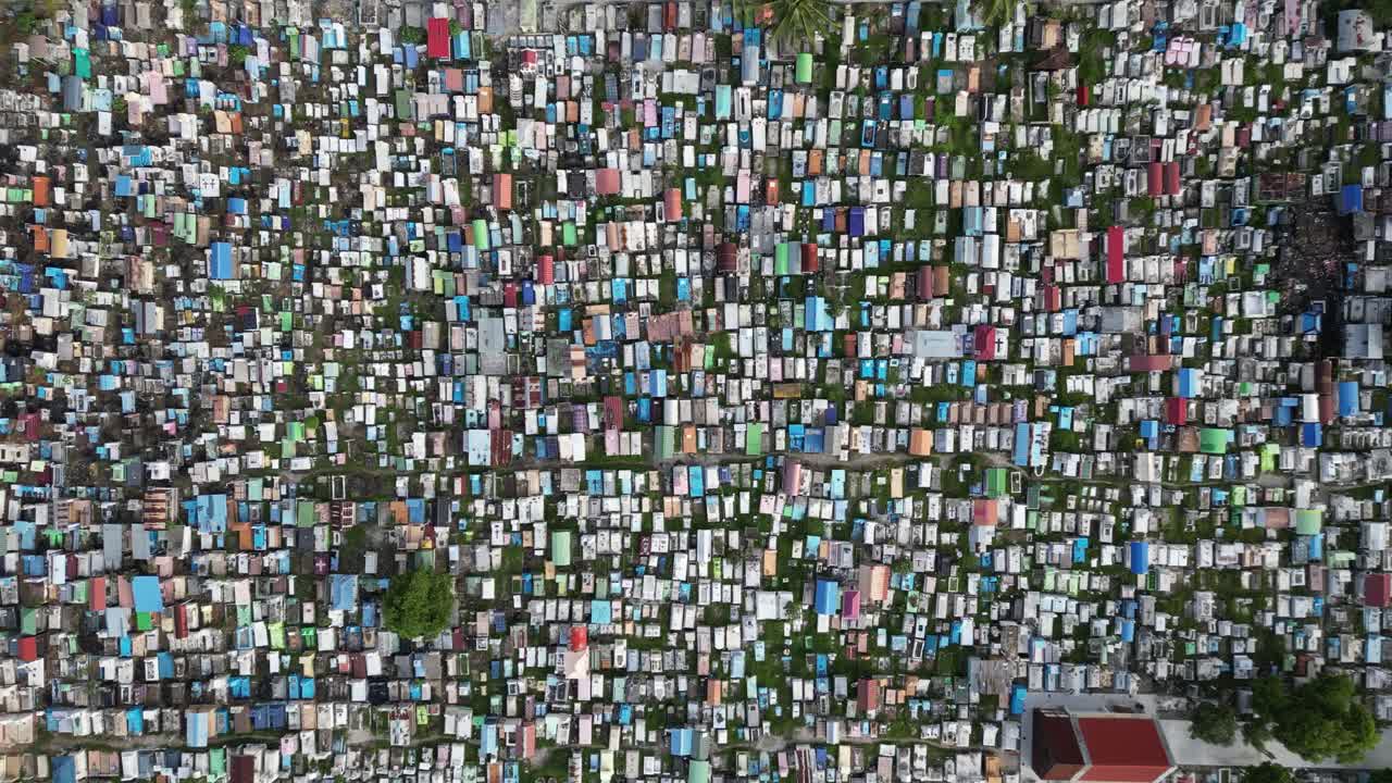 Aerial View of a Densely Packed Cemetery with Colorful Tombs