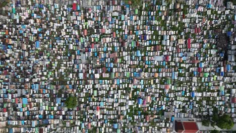 aerial view of a densely packed cemetery with colorful tombs