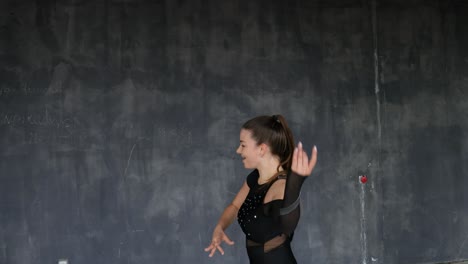 Passionate-and-beautiful-female-dancer-dancing-under-the-bridge-with-dark-background