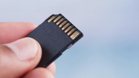 hand holding an sd card