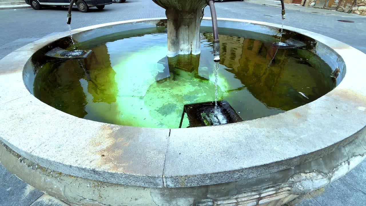 Wishing well, with running water with stone edging
