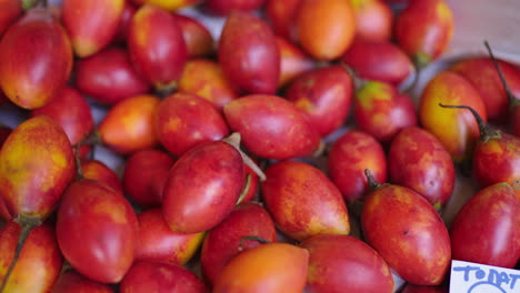 Close-up of a pile of colorful tree tomatoes