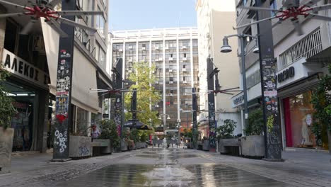cooling fans and fountains to fight a heatwave in siggrou street, thessaloniki, greece