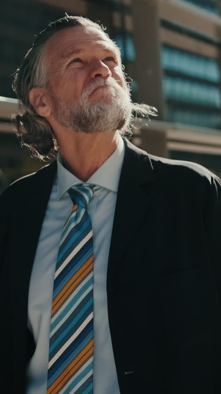 Senior Businessman Enjoys Coffee Outside Office