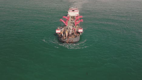 trailing suction hopper dredger navigating offshore in del mar, san diego, california