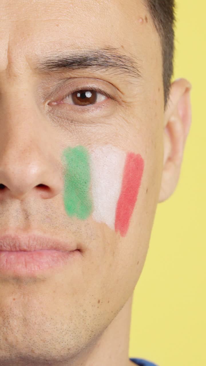 Close up of a man supporting italian team