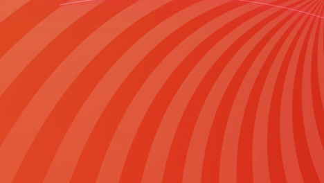 animation of orange stripes spinning on seamless loop