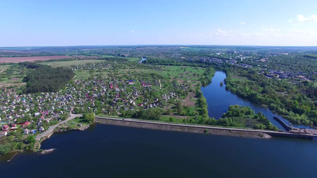 Old dam in countryside. Aerial view of dam on the big river