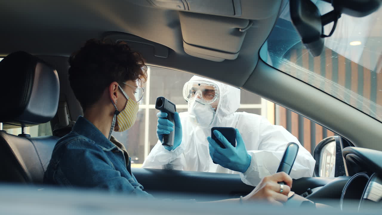 Temperature check in car for COVID-19 screening