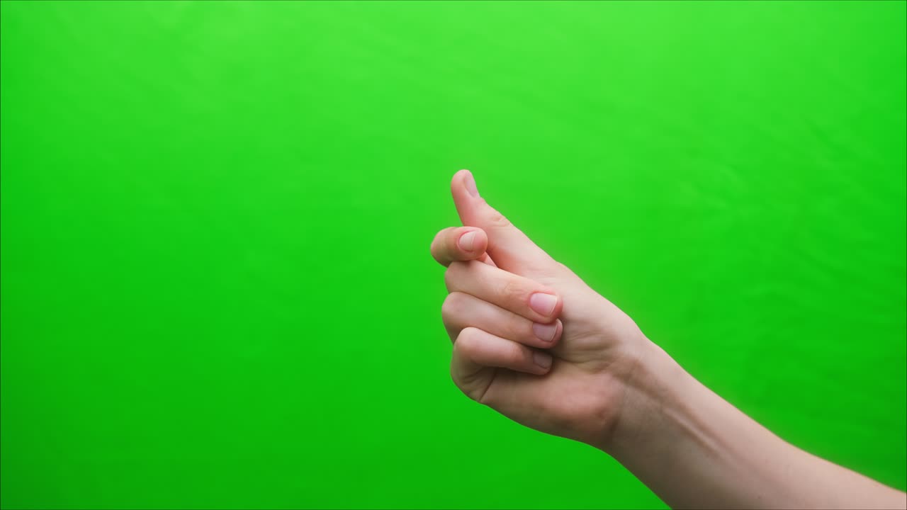 초록색 바탕에 손의 몸짓을 클로즈업, 손가락으로 클릭, 스튜디오에서 몸짓을 촬영, 리 사운드 개념