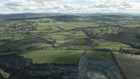 vast green fields near the windmill hill quarry in rathcoole, dublin, ireland