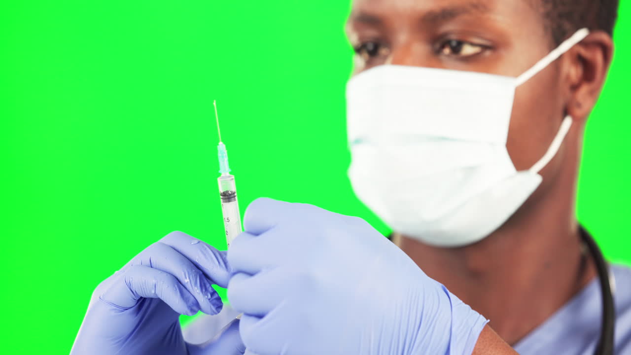 Covid, vaccine and doctor with needle in green