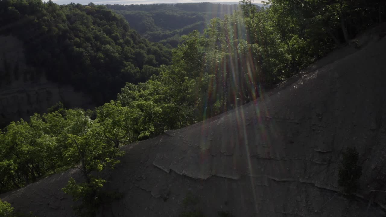 Drone footage of Zoar Valley, New York. This is one clip of many in this series - each of which shows a different angle of the valley and slightly different contents (rivers - mountains) in the frame.