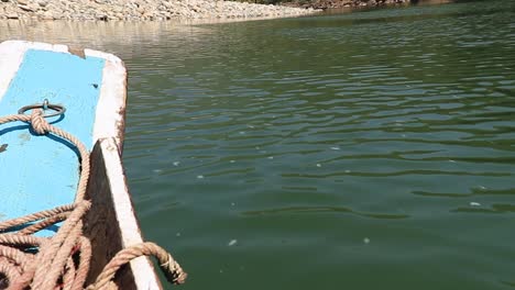 traditional-wood-boat-running-in-river-at-day-video-is-taken-at-umtong-river-dawki-meghalaya-north-east-india