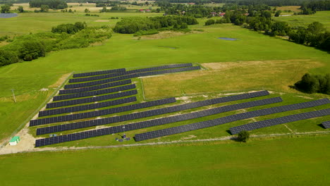 Aerial-flyover-eco-friendly-ecosystem-with-panels-producing-alternative-energy-in-nature