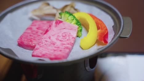 wagyu beef cooking in japanese ryokan small grill