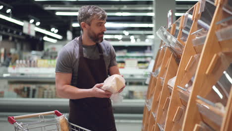 grocery store employee checking dry goods